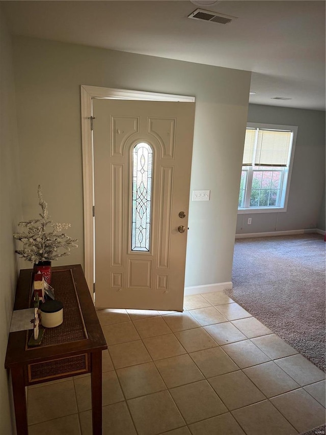 entryway with tile patterned flooring