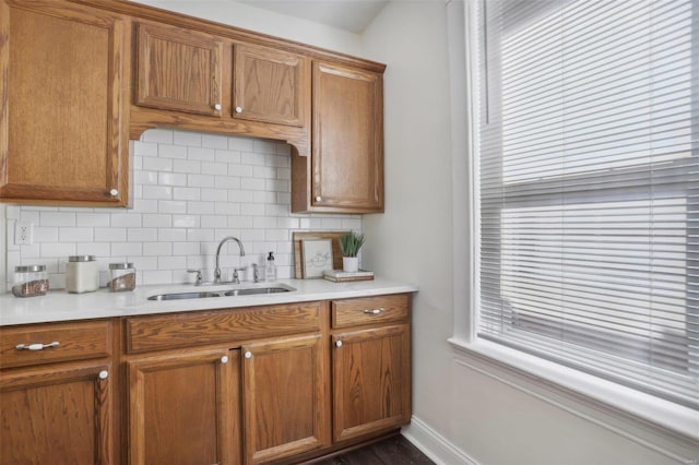 kitchen with decorative backsplash and sink