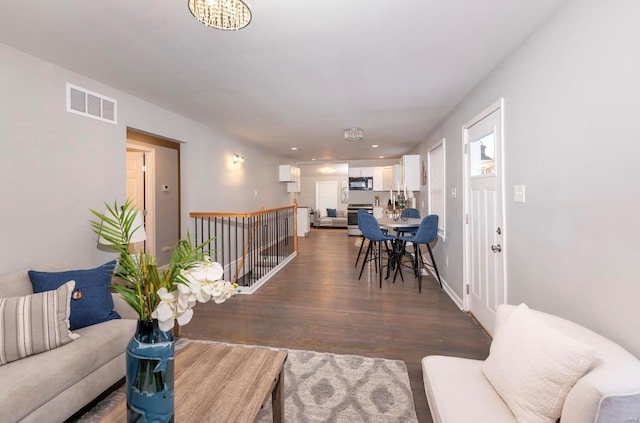 living room featuring dark hardwood / wood-style flooring