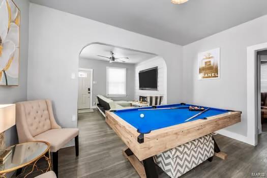 recreation room with dark hardwood / wood-style flooring, ceiling fan, and pool table