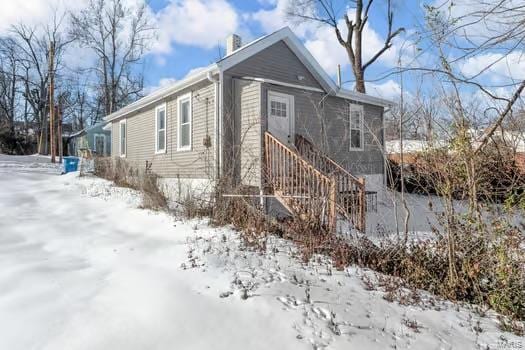 view of snow covered property