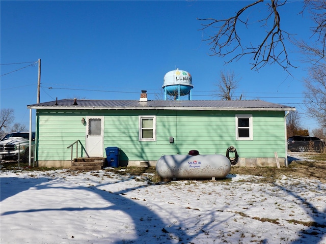 view of snow covered property