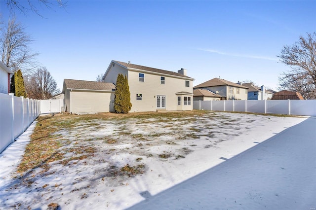 view of snow covered property