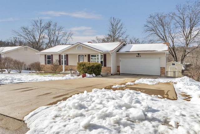 single story home featuring a garage