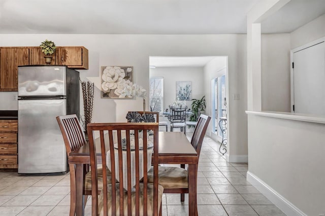 view of tiled dining space