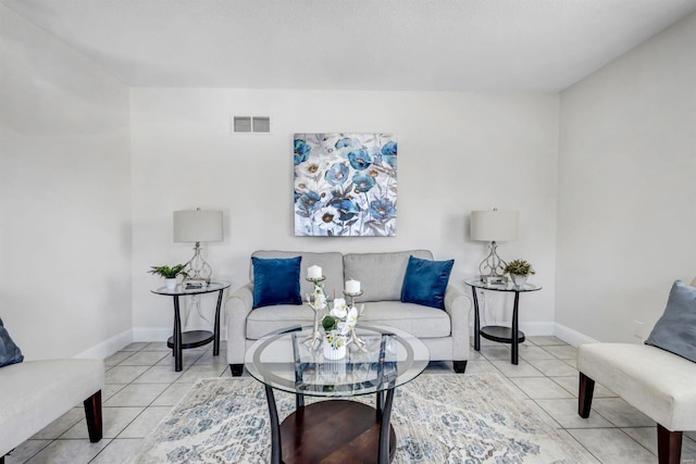 living room featuring light tile patterned flooring