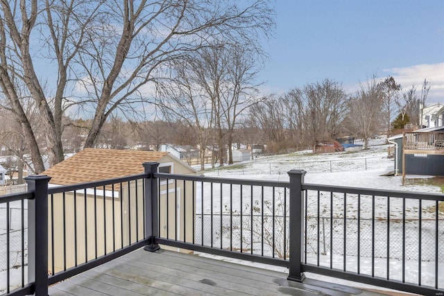 view of snow covered deck