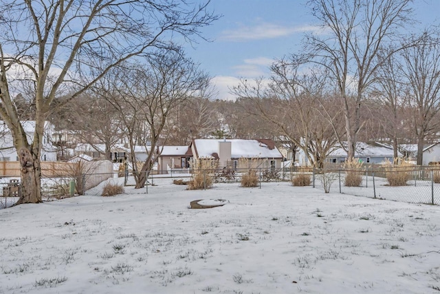 view of yard covered in snow