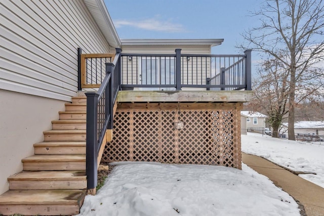 view of snow covered deck