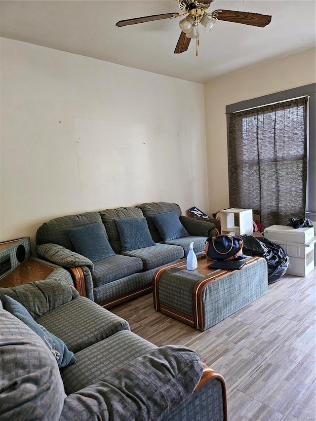 living room featuring ceiling fan