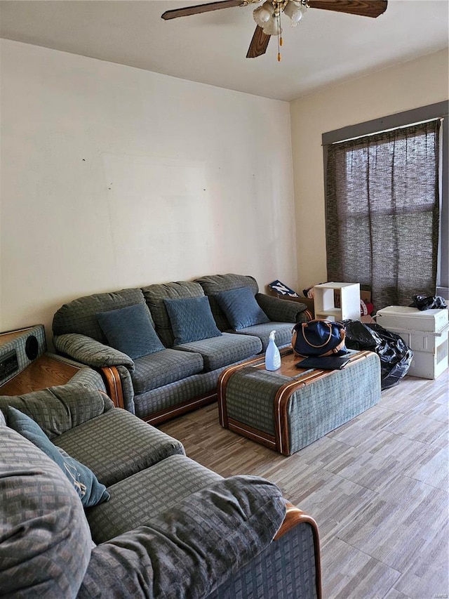 living room featuring ceiling fan