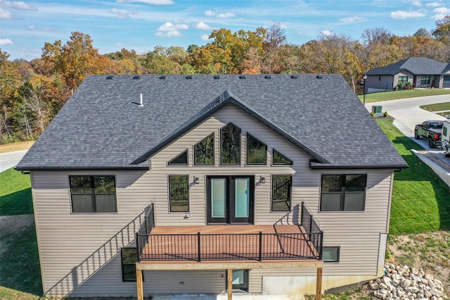 back of house with a garage