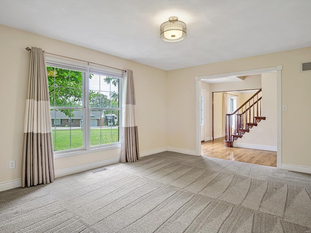 view of carpeted spare room