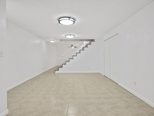 basement featuring ceiling fan