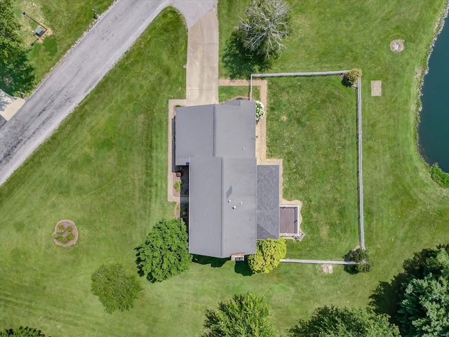 birds eye view of property featuring a water view