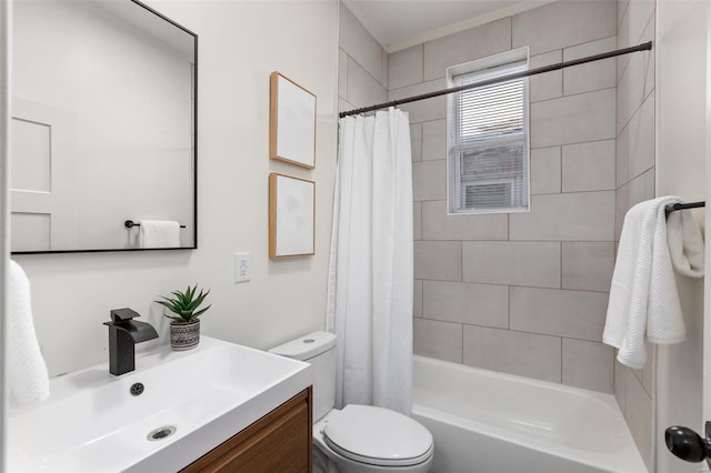 full bathroom with toilet, shower / tub combo, and vanity