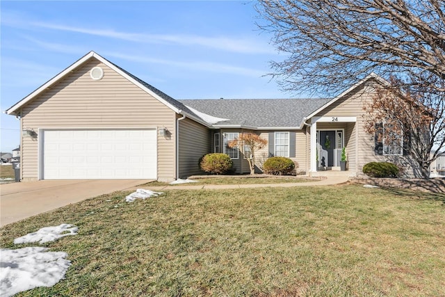 single story home featuring a garage and a front lawn