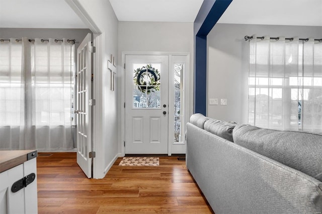 foyer with hardwood / wood-style floors