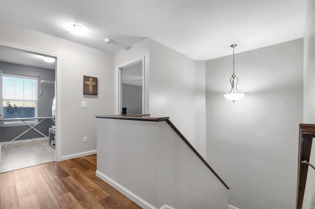 corridor featuring hardwood / wood-style flooring