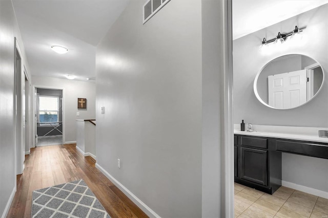 hall featuring light wood-type flooring