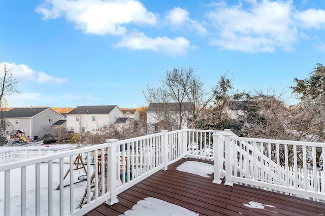 view of snow covered deck