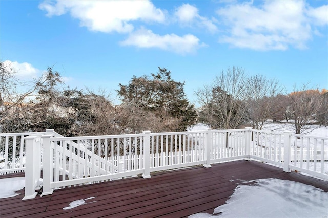 view of snow covered deck