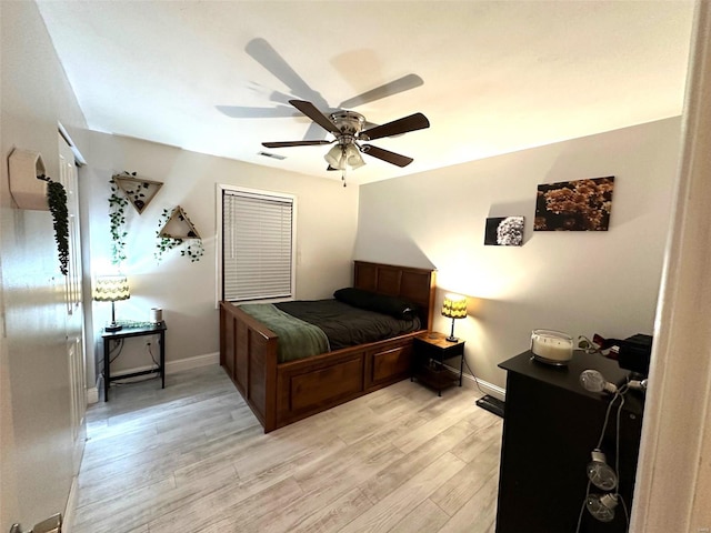 bedroom featuring ceiling fan and light wood-type flooring