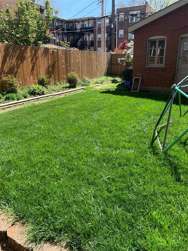 view of yard with fence