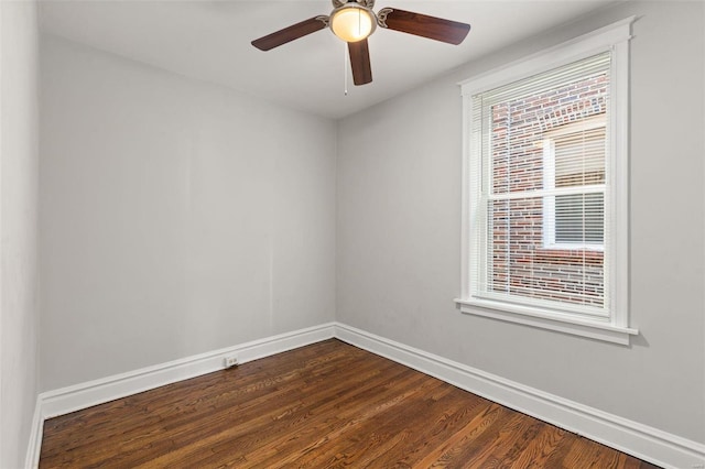 empty room featuring hardwood / wood-style flooring and ceiling fan