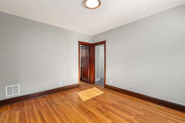 empty room featuring light hardwood / wood-style floors