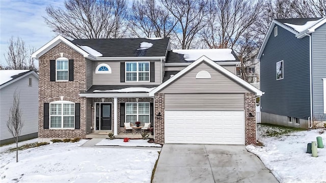 view of front of property with a garage