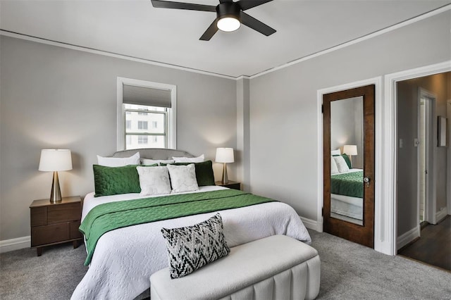 bedroom featuring ceiling fan, carpet floors, and baseboards