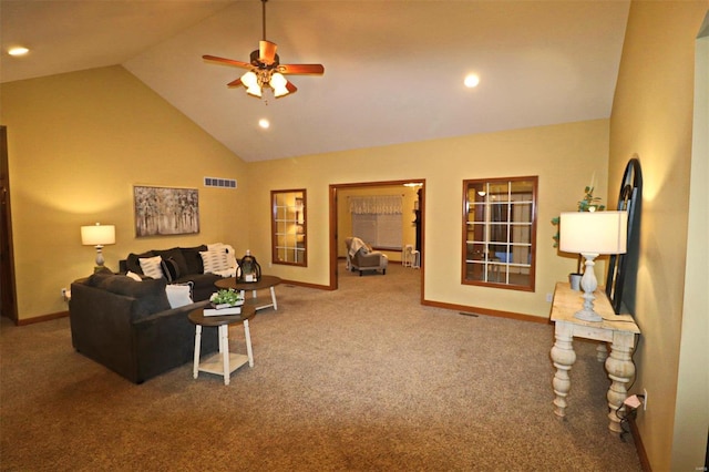 carpeted living room with high vaulted ceiling and ceiling fan