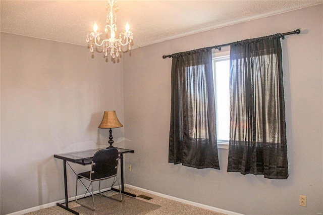 interior space featuring carpet flooring and an inviting chandelier