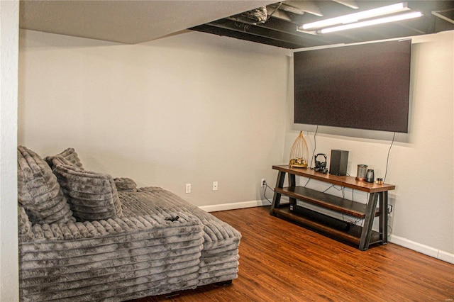 sitting room with dark hardwood / wood-style flooring