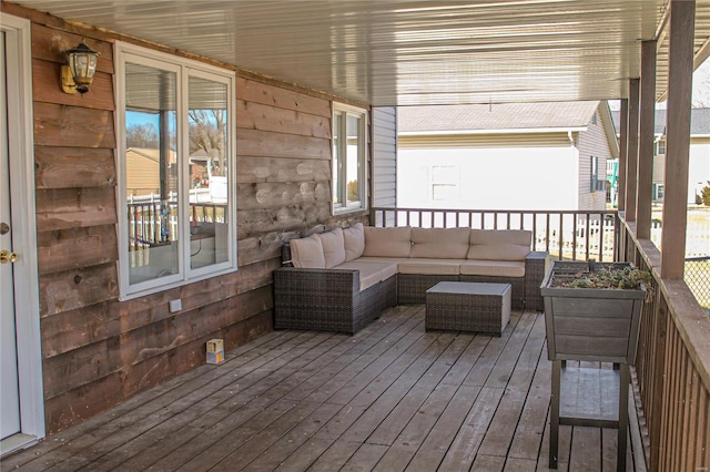 wooden deck with outdoor lounge area