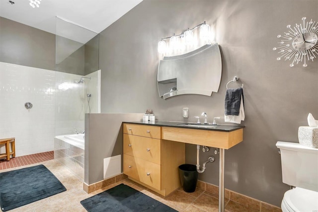 full bathroom featuring sink, tile patterned flooring, toilet, and shower with separate bathtub