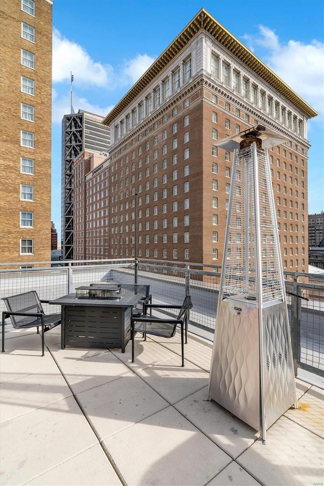 view of patio with an outdoor fire pit