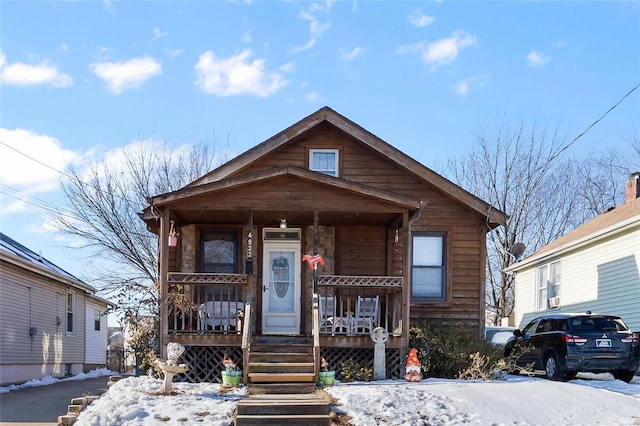 view of front of home featuring covered porch