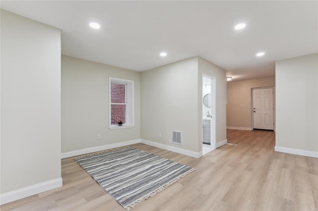 empty room featuring light hardwood / wood-style floors