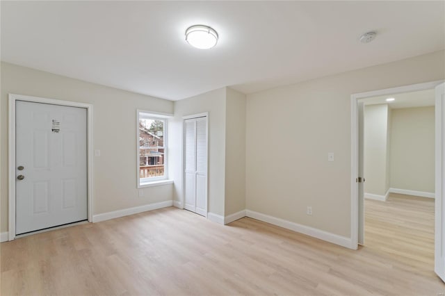 empty room with light wood-type flooring