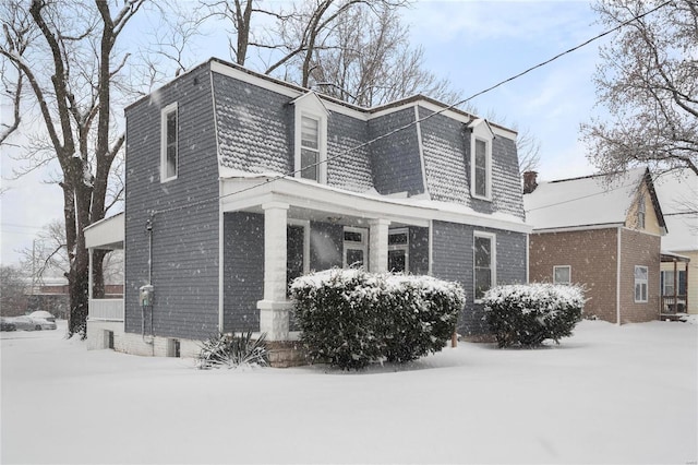 view of snow covered property