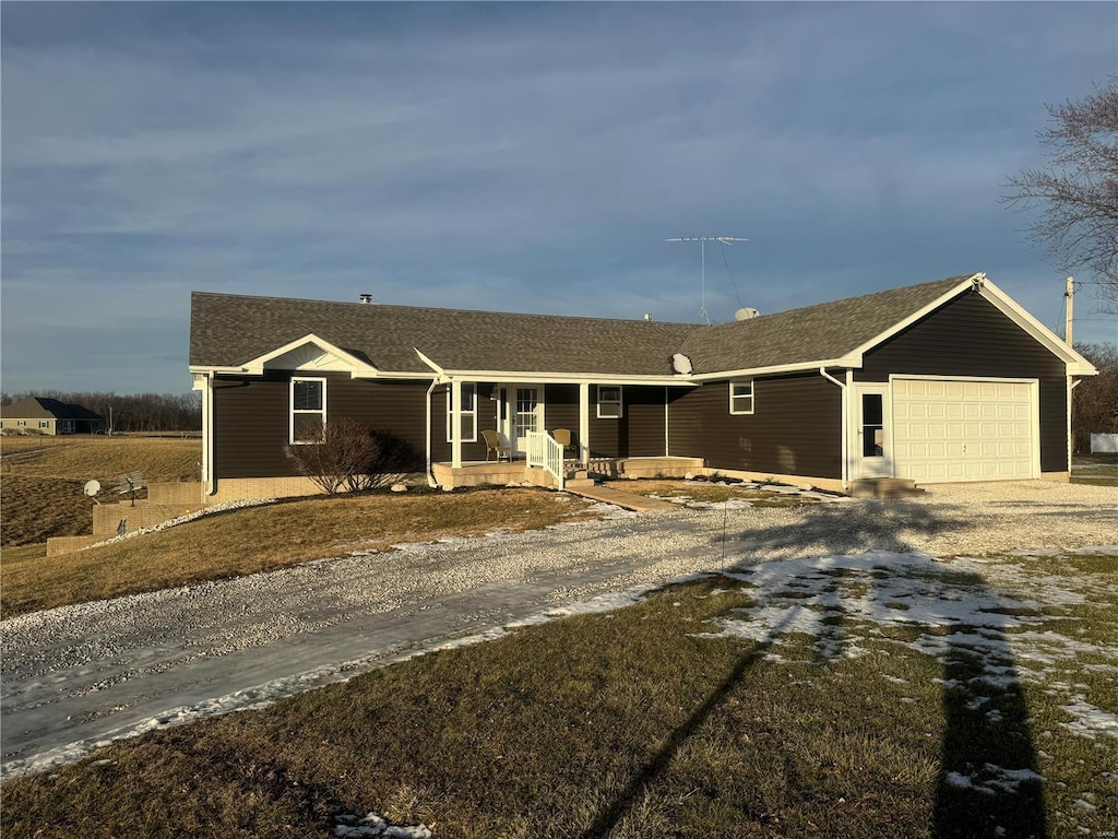 single story home with a garage