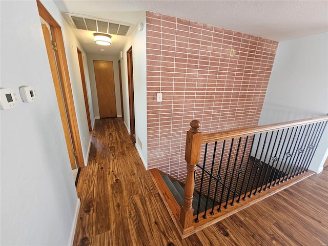 hall featuring wood-type flooring