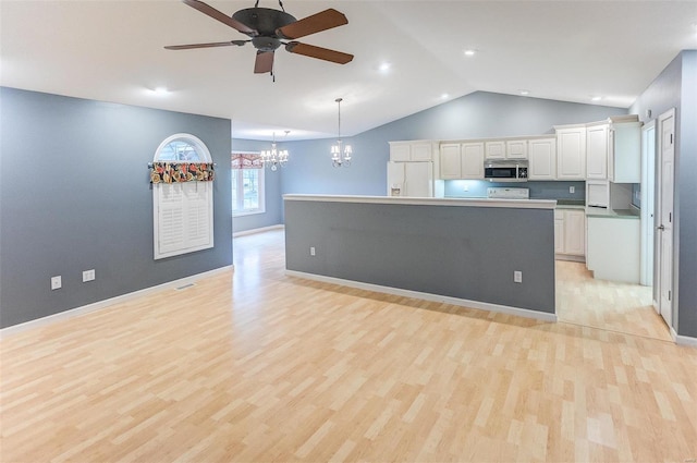 kitchen with white cabinetry, decorative light fixtures, white fridge with ice dispenser, and a kitchen island