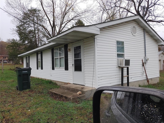 view of home's exterior featuring cooling unit