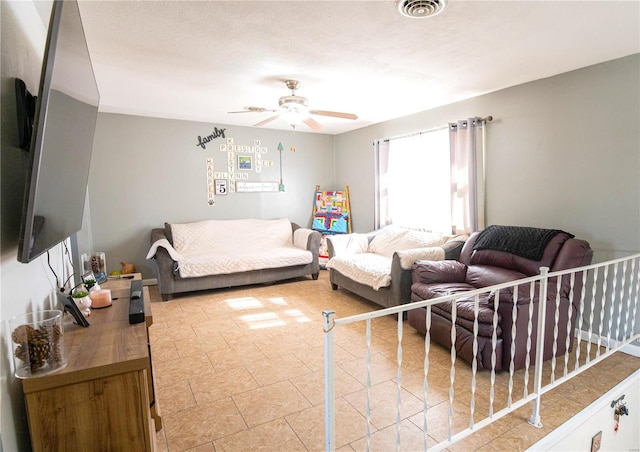 living room with ceiling fan