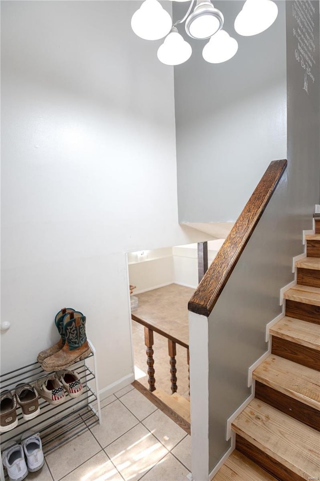 stairs featuring tile patterned floors