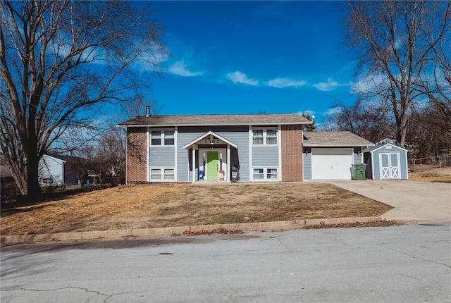 bi-level home with a garage and a front lawn