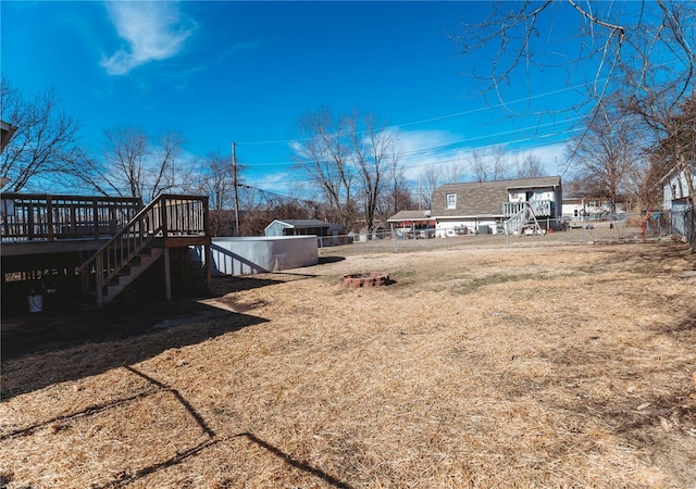 view of yard with a wooden deck